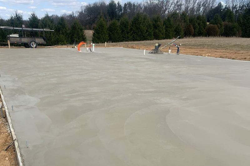 Heated concrete slab with vapor barrier for a new home in Brighton, Indiana