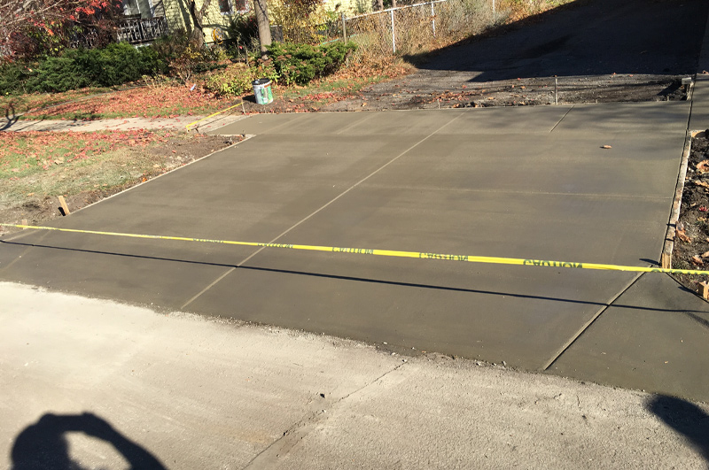 Concrete driveway and connecting sidewalk in Burr Oak, Michigan by Marc Todd Concrete
