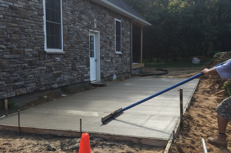 Concrete sidewalk and patio completed in Burr Oak, Michigan by Marc Todd Concrete