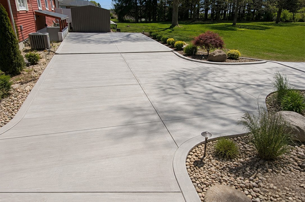 Finished concrete driveway and walkway in Coldwater Michigan by Marc Todd Concrete