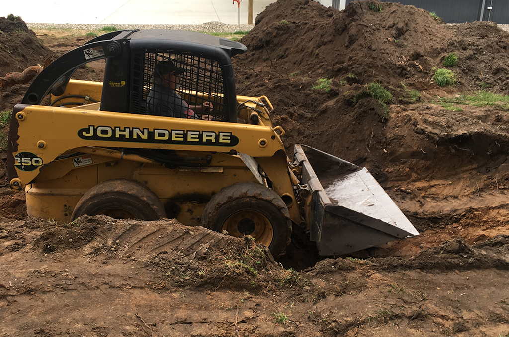Replacing the subgrade during preparation for a concrete driveway in Colon Michigan