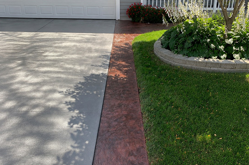 Colored concrete and stamped concrete driveway in Elkhart Indiana by Marc Todd Concrete