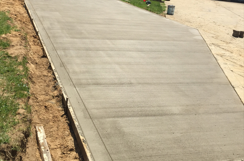 Concrete driveway addition and repair project near Goshen, Indiana