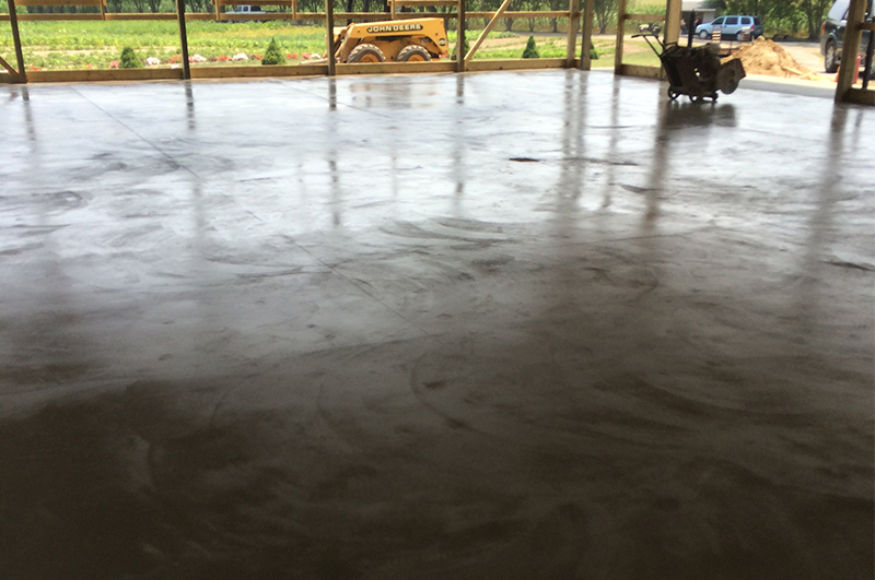 Pole barn concrete floor apron and sidewalk completed in Howe Indiana