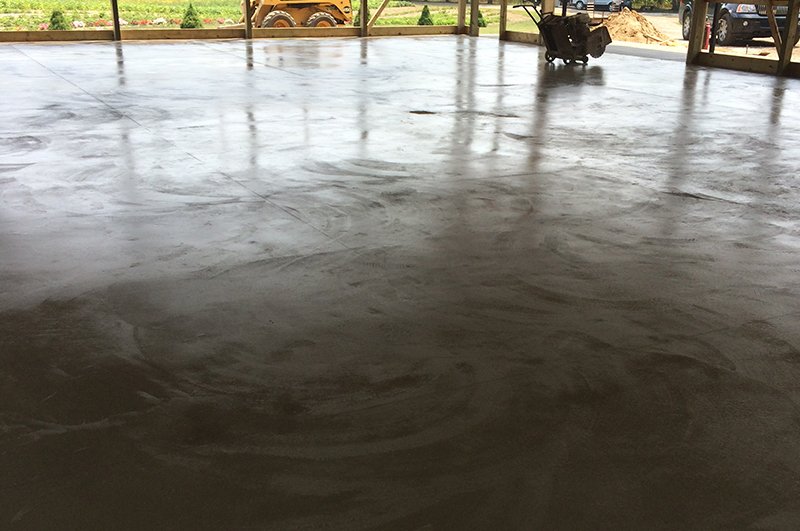 Pole barn floor concrete apron and sidewalk at a fruit farm in Howe Indiana