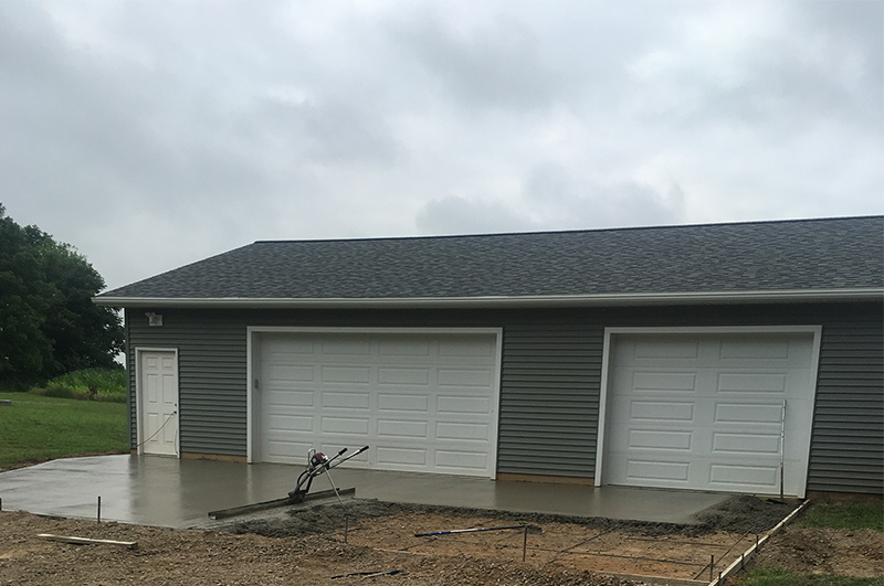 Concrete being poured for a garage floor and apron in Mendon Michigan