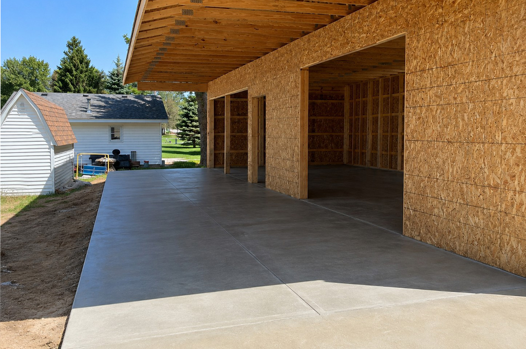 Concrete pole barn floor driveway and apron in Middlebury Indiana by Marc Todd Concrete