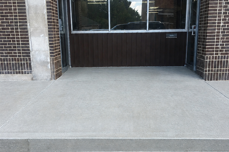 Finished concrete storefront entrance and sidewalk in Niles Michigan