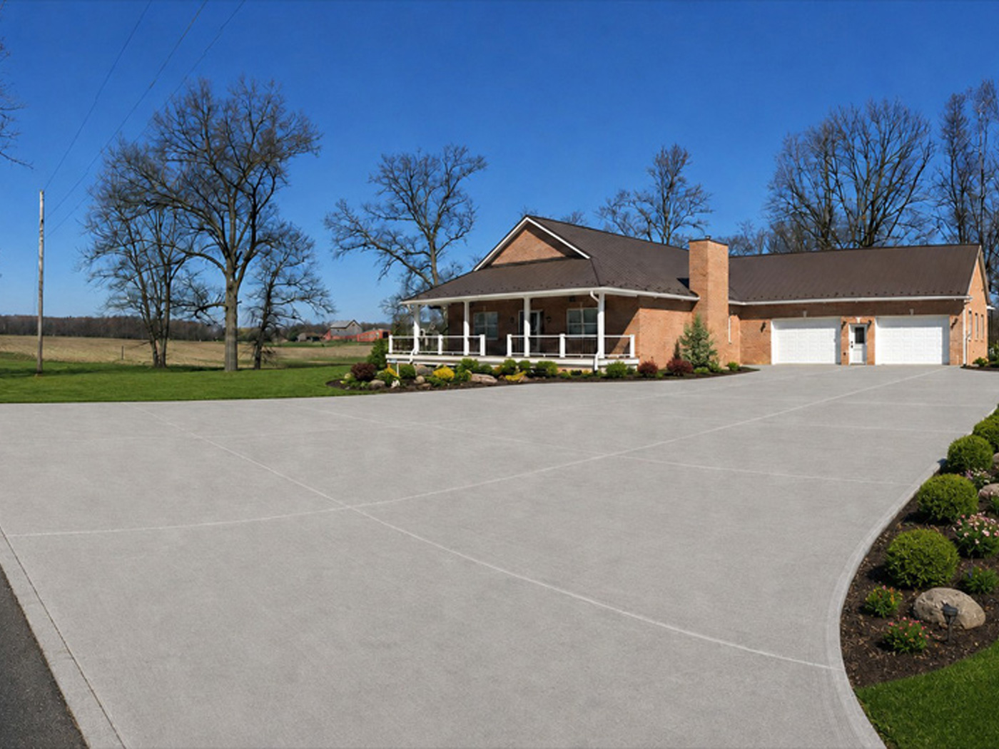 Concrete driveway installed for new construction in Portage, Michigan