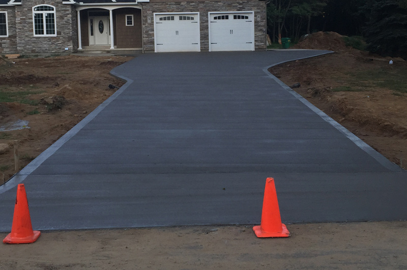 Concrete driveway and new-home flatwork in Schoolcraft, Michigan by Marc Todd Concrete