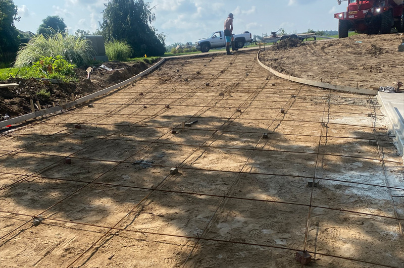 Steep curved concrete driveway completed in Schoolcraft, Michigan by Marc Todd Concrete