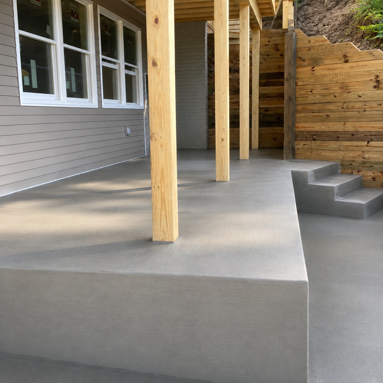 Concrete front porch and steps at Klinger Lake near Sturgis Michigan by Marc Todd Concrete