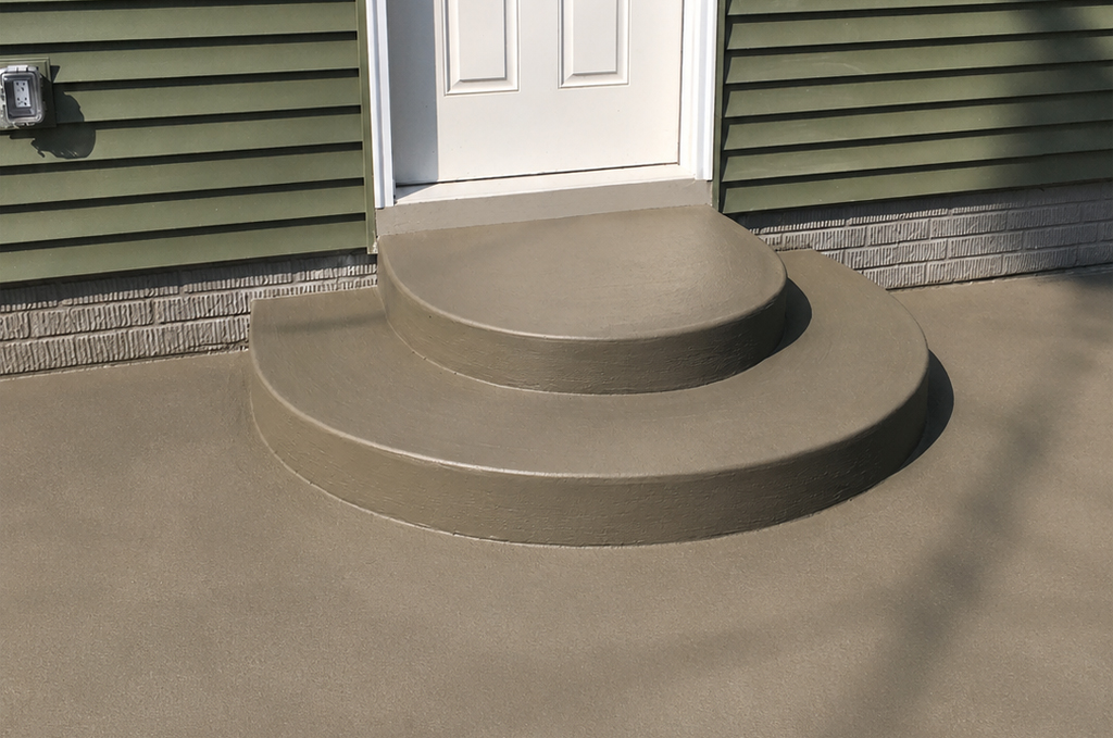 Concrete driveway and custom entry steps at Klinger Lake near Sturgis Michigan by Marc Todd Concrete