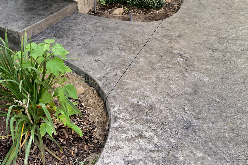 Stamped concrete step, sidewalk and slab in Syracuse, Indiana