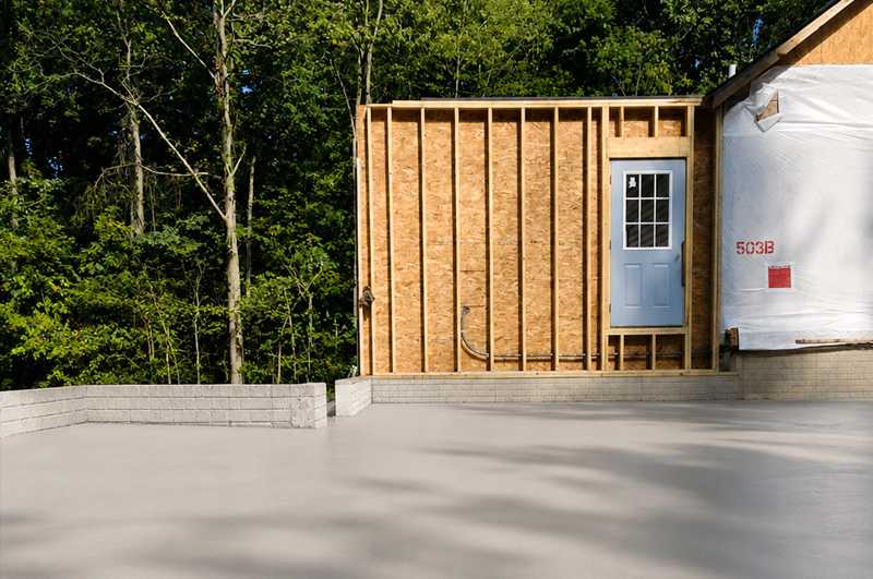 Concrete floor poured for a new home addition in Syracuse, Indiana