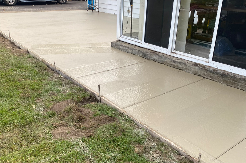 Residential concrete patio at Union Lake in Union City, Michigan