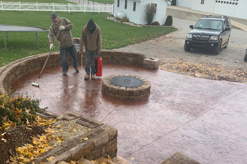 Stamped concrete patio and landscaped hardscape in Vandalia, Michigan by Marc Todd Concrete