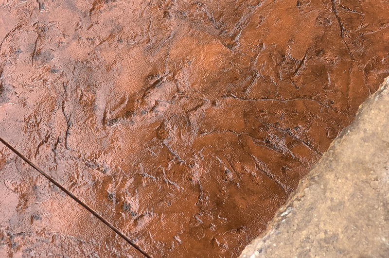 Close view of a finished stamped concrete patio in Vandalia, Michigan