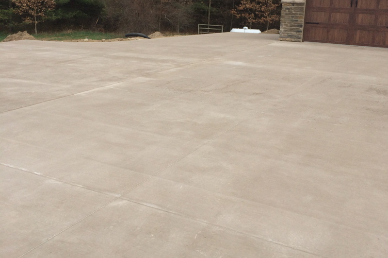 Colored concrete driveway for new residential construction in Vicksburg, Michigan