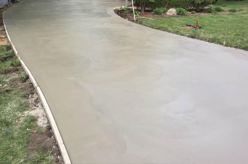 Curved residential concrete driveway completed in Vicksburg, Michigan