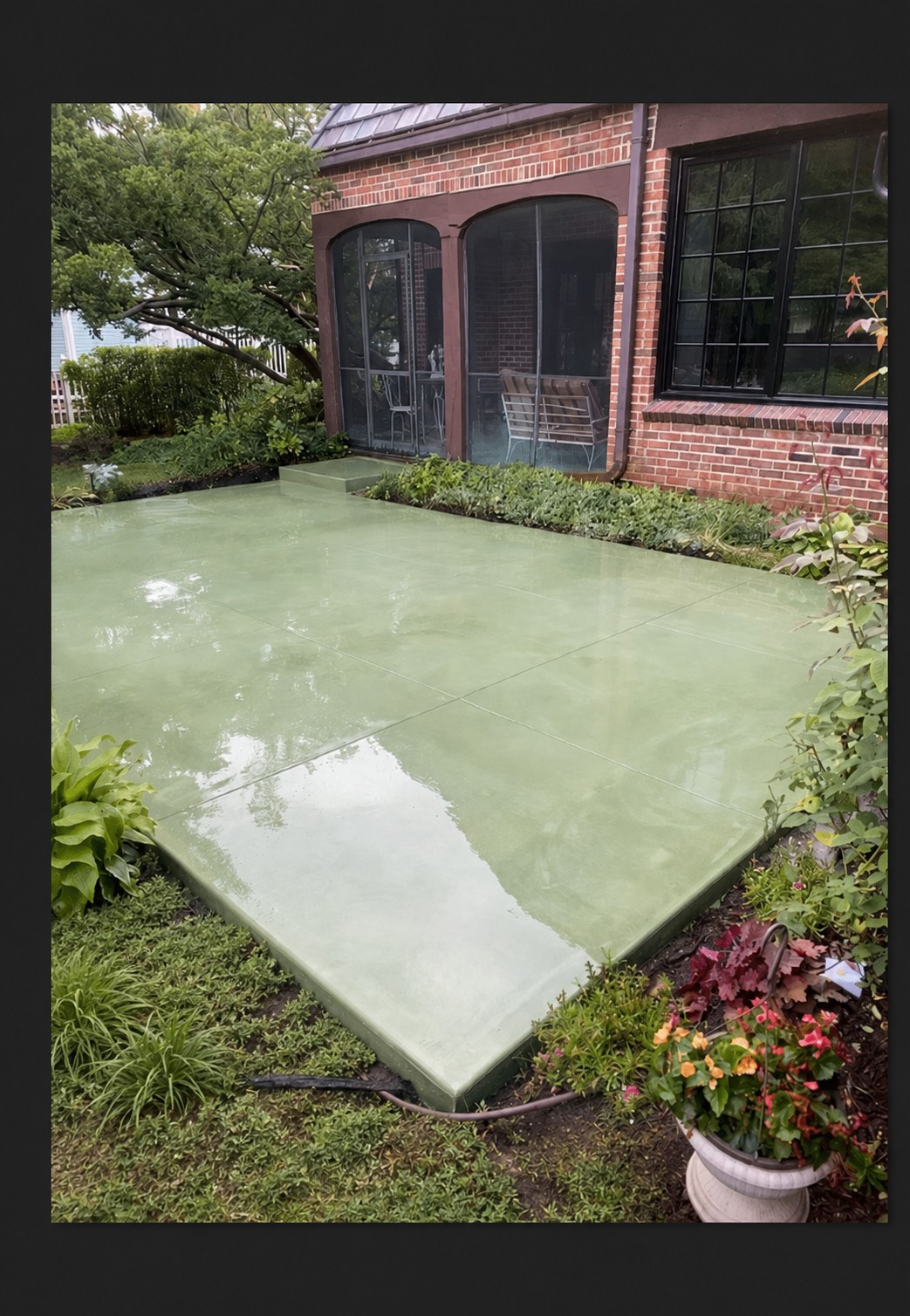 Custom colored concrete patio and step at a residence in Sturgis, Michigan