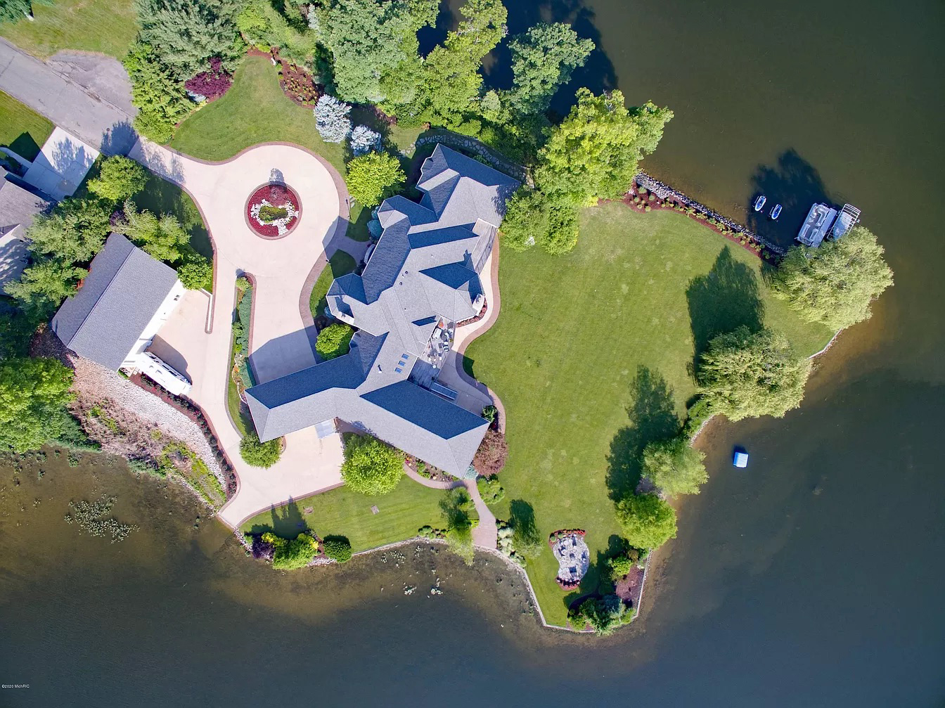 Aerial view of the completed Lake Templene reinforced concrete seawall in Sturgis, Michigan