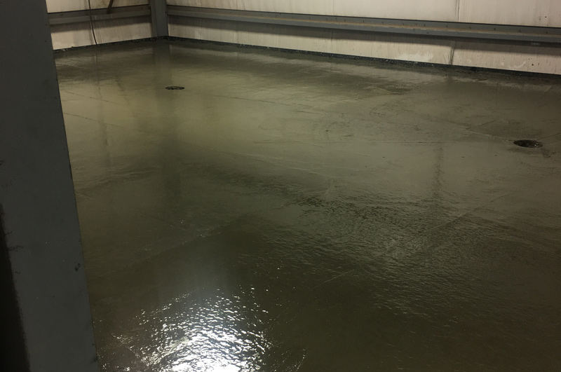 Finishing operations underway on the elevated commercial concrete floor in LaGrange