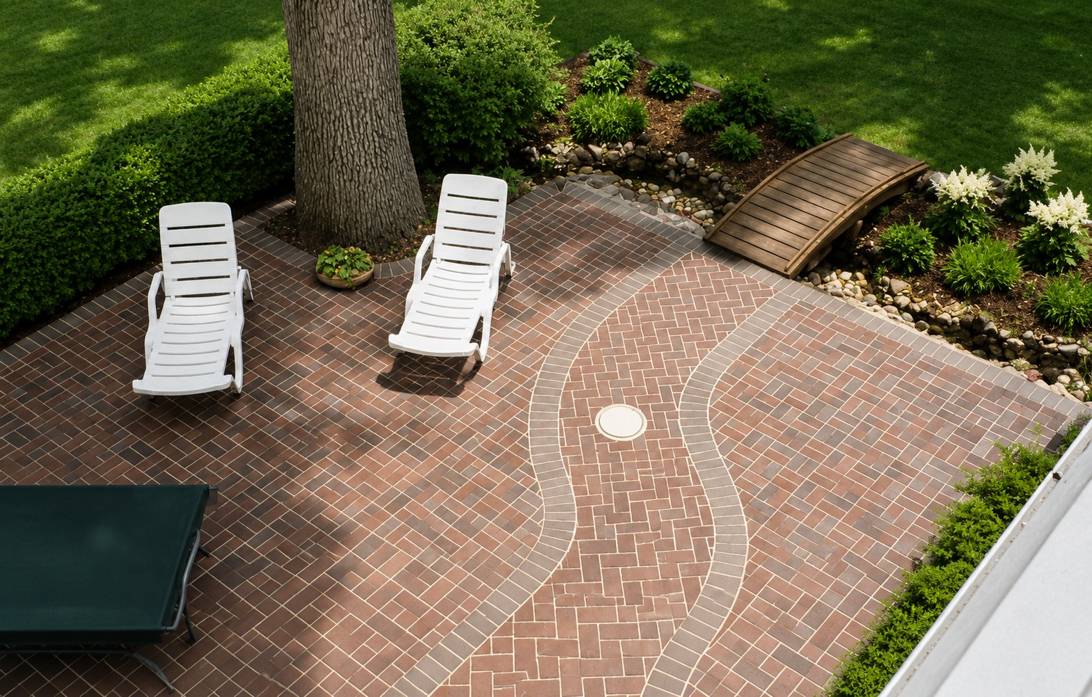Concrete paving brick patio and walkway installed by Marc Todd Concrete