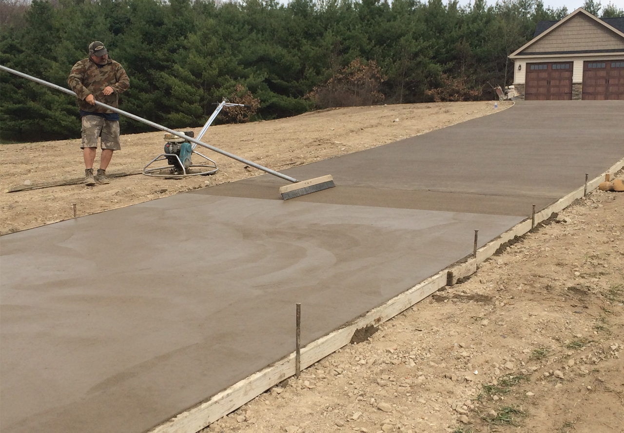 Light earth-tone colored concrete driveway in LaGrange Indiana