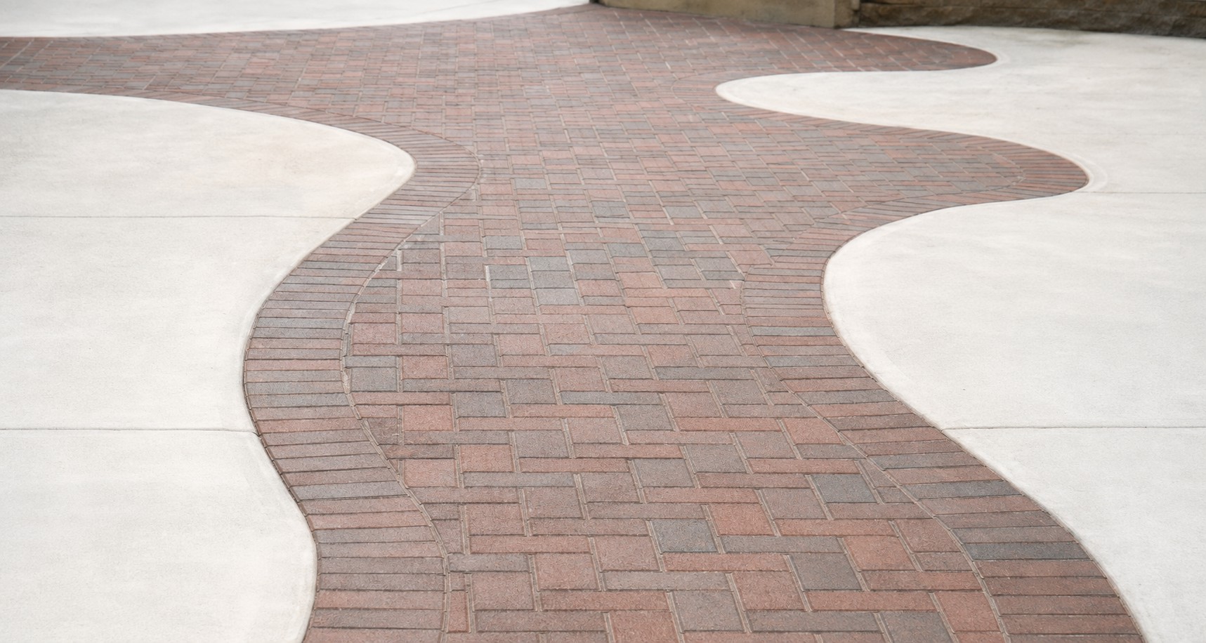 Custom concrete paving brick walkway