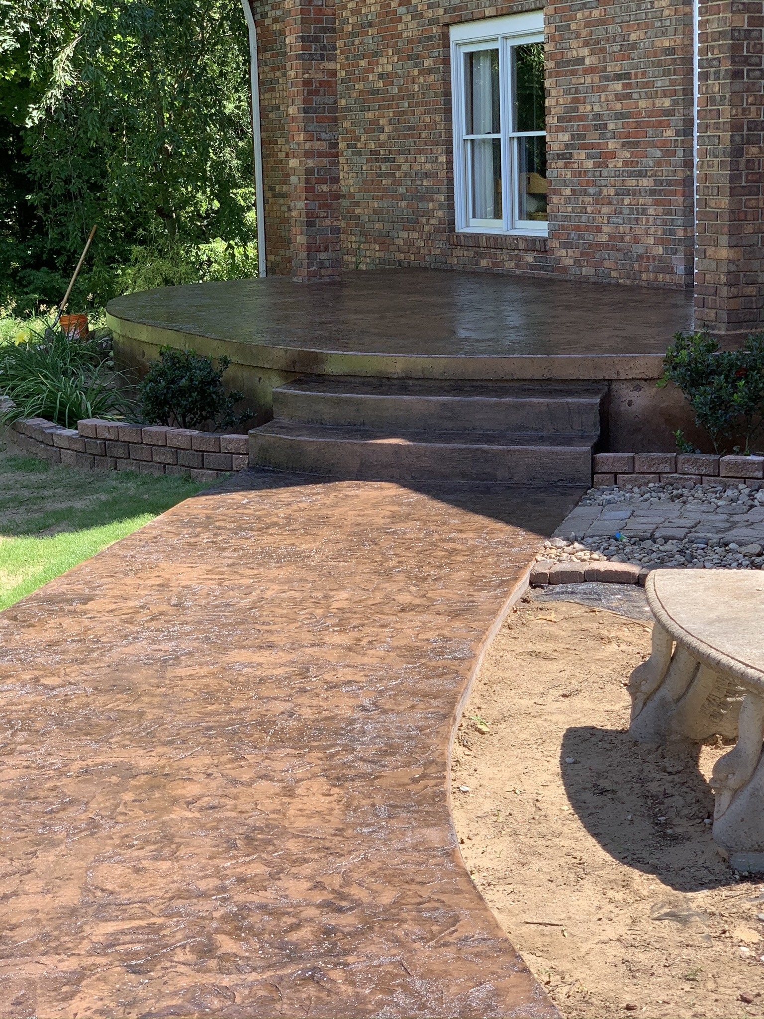 Close view of the decorative stamped concrete patio pattern