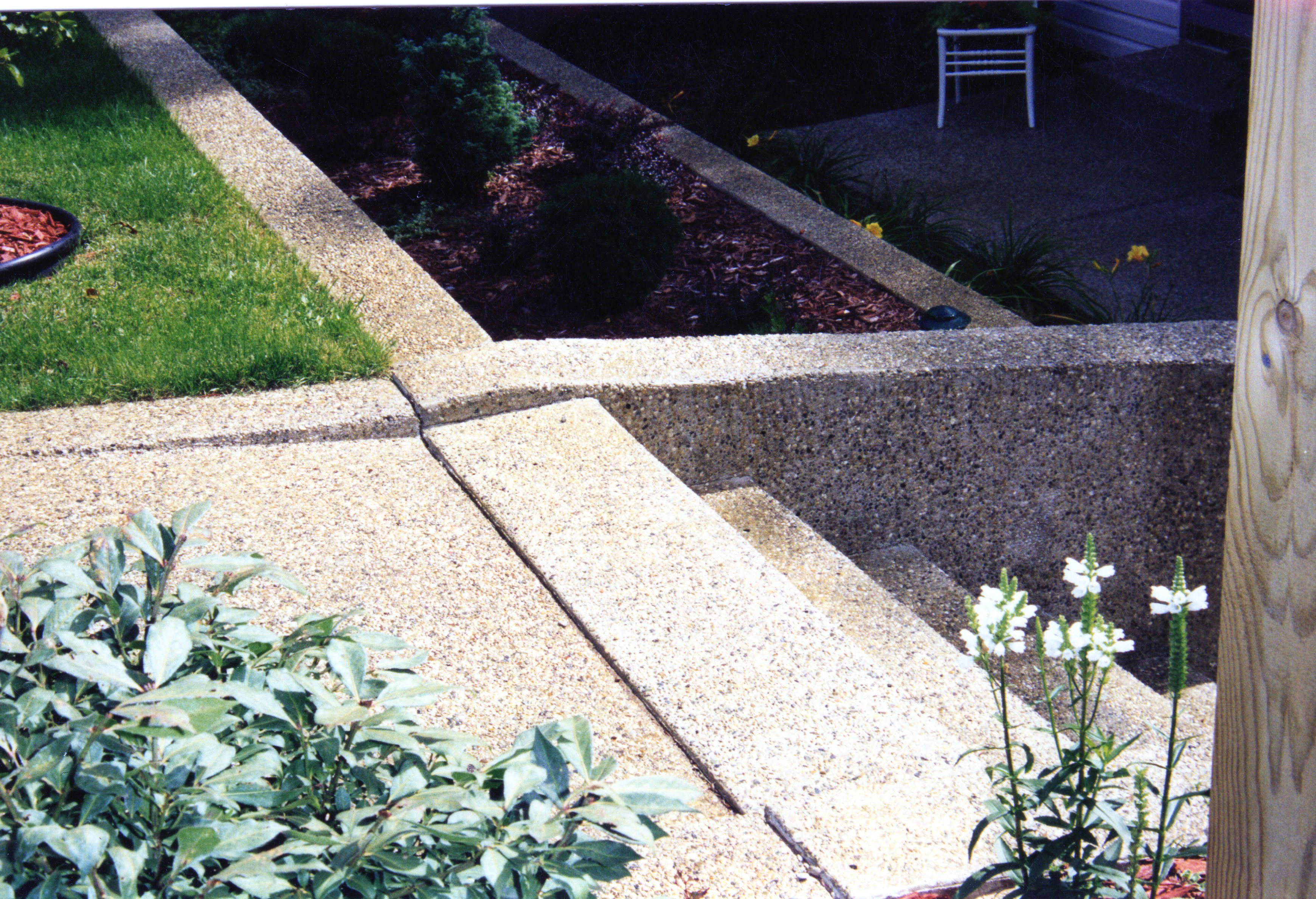 Exposed aggregate hardscape with concrete retaining walls in Sturgis Michigan