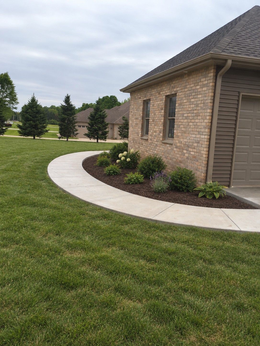 Curved concrete sidewalk in Granger, Indiana