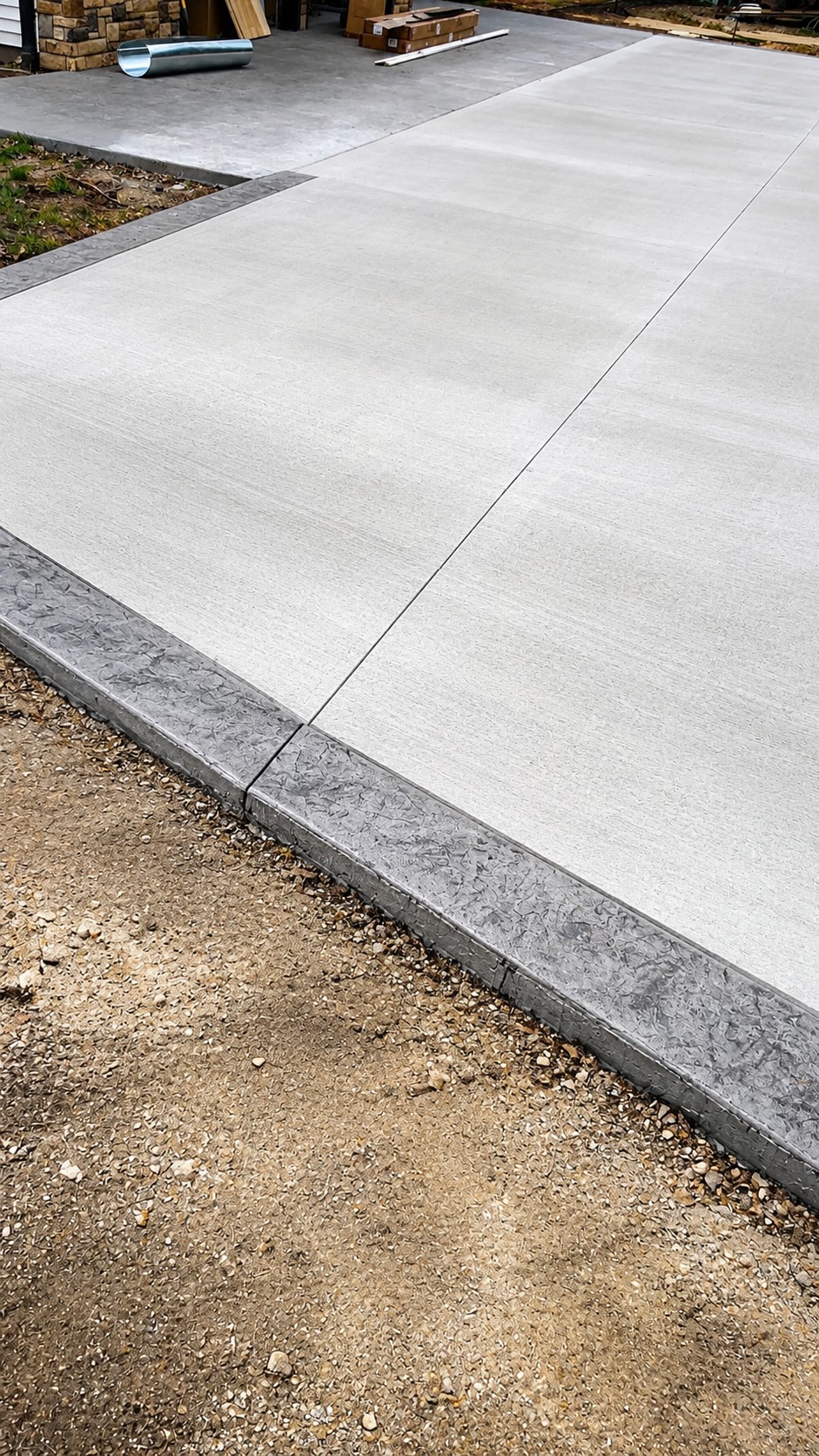 Stamped concrete driveway border near Lake Templene in Centreville, Michigan