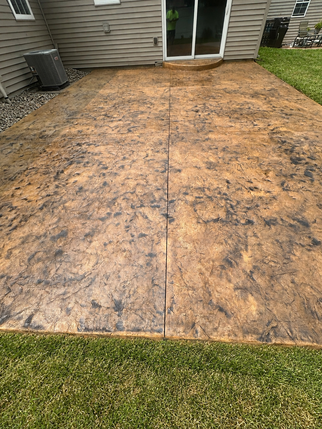 Stamped concrete slab and custom steps completed in Three Rivers, Michigan