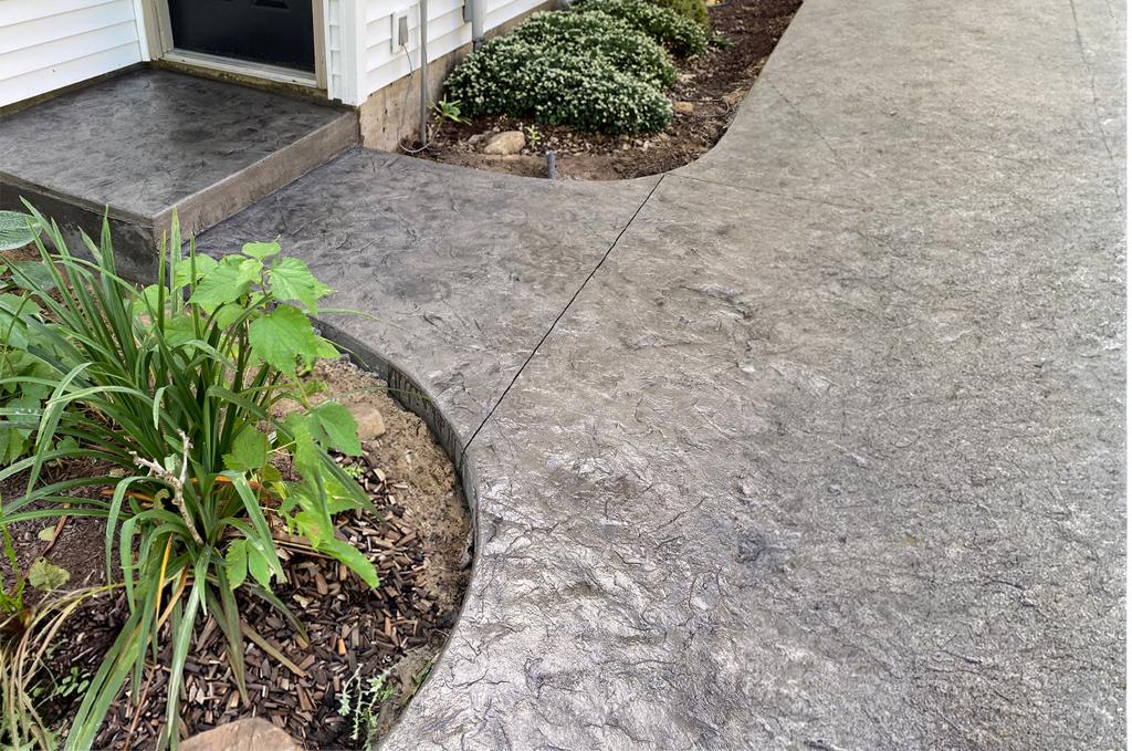 Stamped concrete steps, walkway and entrance near Lake Templene in Centreville, Michigan